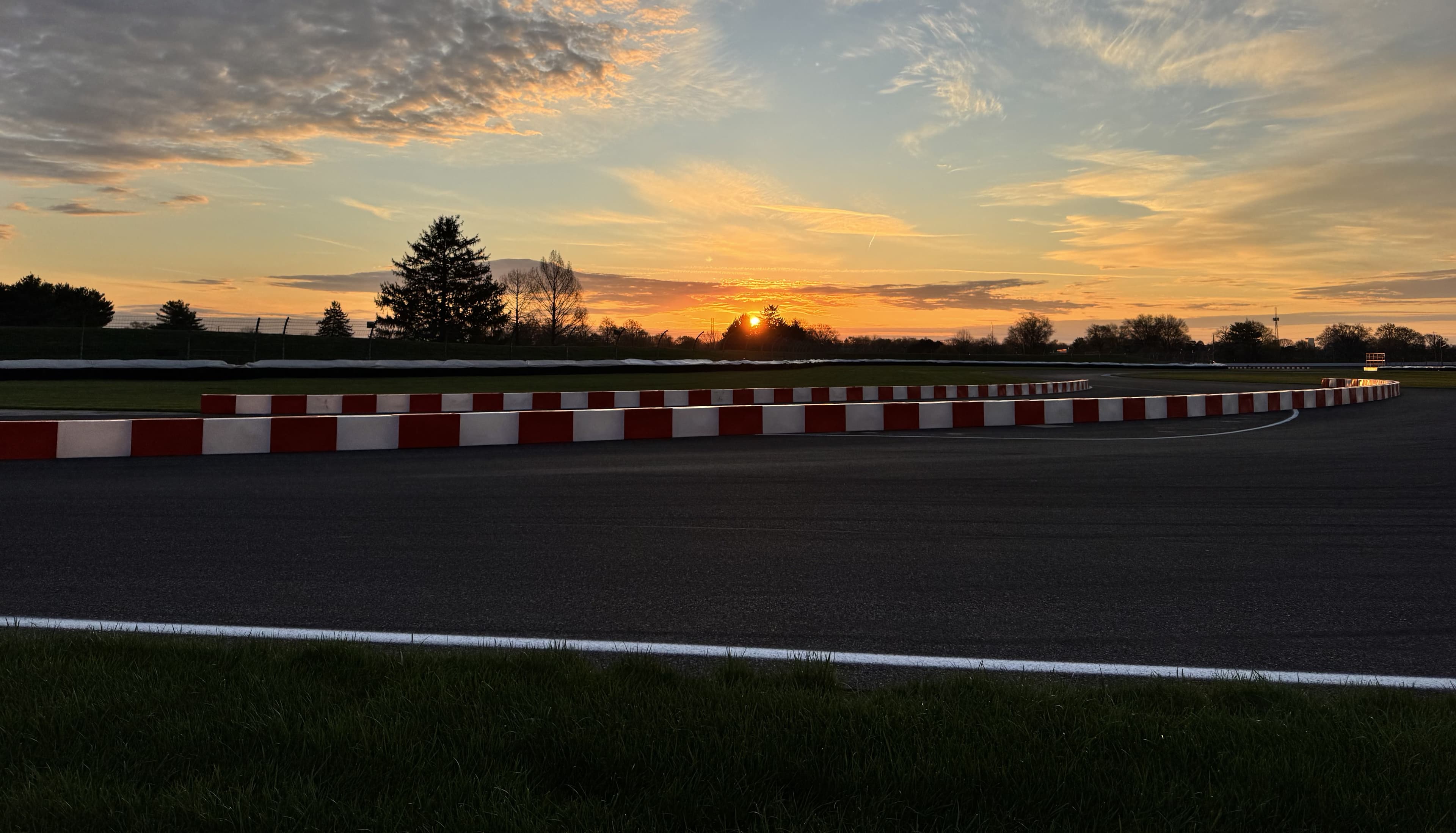 Cornell Electric Vehicles at sunset on track
